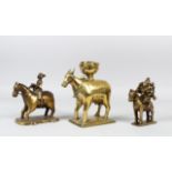 THREE 18TH-19TH CENTURY INDIAN BRONZE FIGURES, one of an oxen the other of equestrian figures, 13cm,