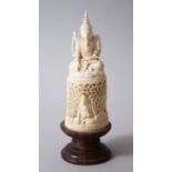 A FINE 19TH CENTURY BURMESE CARVED IVORY FIGURE ON A WOODEN BASE.