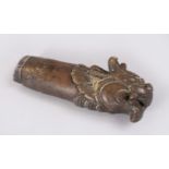 AN 18TH CENTURY NORTH INDIAN BRONZE KNIFE HILT in the form of a makara head with lotus design and