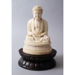 A GOOD 19TH CENTURY CHINESE CARVED IVORY FIGURE OF SEATED EMPEROR , sat in a meditation position,