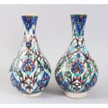A GOOD PAIR OF KUTHAYA POTTERY VASES, 30cm high.