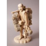 A CHARMING JAPANESE MEIJI PERIOD IVORY OKIMONO OF A BASKET SELLER, the man stood with a length of