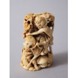 A GOOD JAPANESE MEIJI PERIOD CARVED IVORY OKIMONO OF A SAMURAI BATTLE, the samurai seated upon