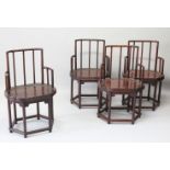 A LATE 19TH / 20TH CENTURY SET OF FOUR CHINESE HARDWOOD ARMCHAIRS, with simply carved frieze,