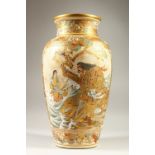 A JAPANESE MEIJI PERIOD SATSUMA VASE DEPICTING IMMORTALS, the vase with raised moriage style