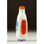 A 19TH CENTURY CHINESE THREE COLOUR OVERLAY WHITE GLASS SNUFF BOTTLE, the sides with carved blue
