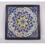 A LARGE EARLY ISLAMIC SET OF FOUR POTTERY TILES with Stafford motif, each tile 20cm squared in a