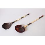 TWO 18TH CENTURY OTTOMAN TURKISH SHERBET SPOONS, tortoiseshell, ivory, bone and amber, 23cm long.