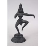 A 20TH CENTURY ORIENTAL BRONZE STATUE OF A DEITY / GODDESS, stood in a dancing pose upon a lotus
