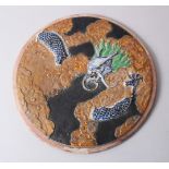 A 20TH CENTURY CHINESE ENAMEL DRAGON DISH / ROUNDEL, the scene of a dragon appearing through clouds,