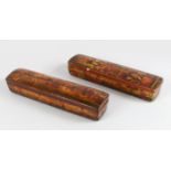 A GOOD PAIR OF LARGE QALAMDAN PAPIER MACHE PEN BOXES, 28cm long.