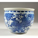 A 19TH CENTURY CHINESE BLUE & WHITE PORCELAIN JARDINIERE, decorated with scenes of birds and