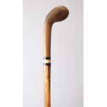 A 19TH CENTURY CHINESE RHINOCEROS HORN WALKING STICK, the collar formed from ivory and ebony
