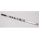 A GOOD CHINESE 19TH CENTURY SILVER MOUNTED EBONY BATON, the ebony baton with an intertwining dragon,