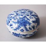 A 19TH CENTURY CHINESE BLUE & WHITE PORCELAIN BOX & COVER, decorated with birds amongst trees, 6cm