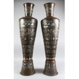 A LARGE PAIR OF EYGPTIAN CAIRO WARE COPPER INLAID BRASS VASES, 82cm high.