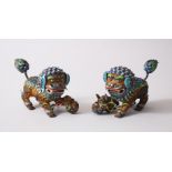 A PAIR OF 19TH / 20TH CENTURY CHINESE SILVER GILT & ENAMEL LION DOG FIGURES, the underside of the