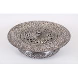 A GOOD 19TH CENTURY OR EARLIER INDIAN BIDRI SILVER INLAID CIRCULAR BOWL AND COVER with pierced cover