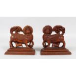 A GOOD PAIR OF 19TH CENTURY SOUTH INDIAN MAYSORE CARVED SANDLWOOD FIGURES of mythological figures,