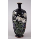 A JAPANESE MEIJI PERIOD SILVER WIRE CLOISONNE VASE, depicting scenes of floral spray, worked in