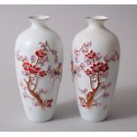 A PAIR OF CHINESE FAMILLE ROSE EGG SHELL PORCELAIN VASES, decorated with scenes of birds amongst