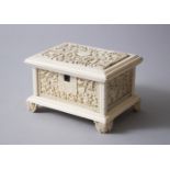 A GOOD 19TH CENTURY CHINESE EXPORT CARVED IVORY CASKET, carved with scenes of oriental figures