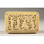 A 19TH CENTURY CHINESE CARVED IVORY SNUFF BOX, carved in deep relief with scenes of figures