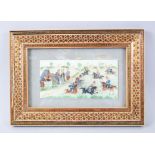 A PERSIAN PAINTING ON IVORY of people playing polo, 10cm x 20cm in a mosaic frame.