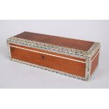 A 19TH CENTURY INDIAN IVORY INLAID SANDLEWOOD RECTANGULAR BOX AND COVER, 28cm long.