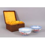 A PAIR OF 20TH CENTURY REPUBLIC STYLE CHINESE EGGSHELL BOWLS IN FITTED BOX, decorated with scenes of