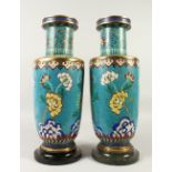 A PAIR OF 19TH CENTURY CHINESE CLOISONNE VASES, both affixed to marble stands, the vases decorated