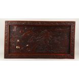 A GOOD JAPANESE MEIJI PERIOD SHIBAYAMA & HARDWOOD CARVED PANEL, depicting scenes of two figures