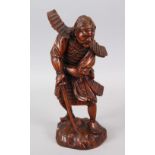 A GOOD JAPANESE MEIJI PERIOD CARVED WOOD OKIMONO OF A SAMURAI WARRIOR, the warrior stood in full