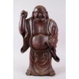 A LARGE & HEAVY 18TH CENTURY? CHINESE STONE FIGURE OF BUDDHA, stood with his hand aloft holding a