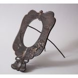 A GOOD JAPANESE MEIJI PERIOD BRONZE & MIXED METAL FAN SHAPED FRAME, with scenes of samurai amongst