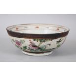 A LATE 19TH CENTURY CHINESE FAMILLE ROSE CRACKLE GLAZE BOWL, decorated with scenes of birds