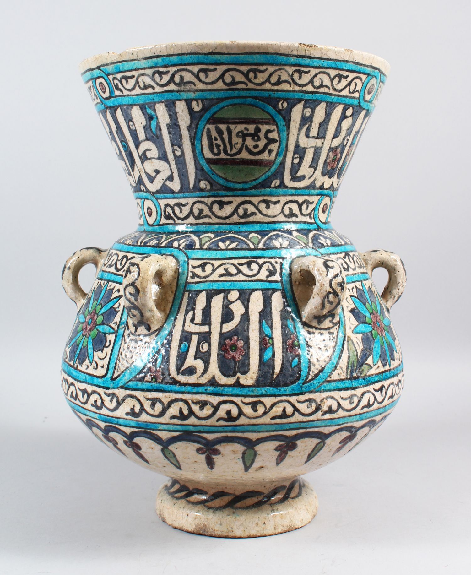 AN 18TH-19TH CENTURY DAMASCUS POTTERY BULBOUS MOSQUE LAMP OF MAMLUK STYLE, with one handle, notch