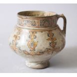 A RARE 12TH-13TH CENTURY PERSIAN KASHAN POTTERY JUG with calligraphy, 14cm high.