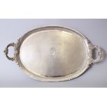 A PERSIAN SILVER TWO HANDLED TRAY, engraved 'Souvenir of Halfa Province To S. A. Teppetts, 1922',