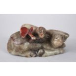 A CHINESE CARVED JADE FIGURE OF RECUMBENT OXEN & MONKEY, 10cm wide X 4.5cm high.