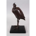 A JAPANESE MEIJI PERIOD BRONZE OIMONO OF AN EGRET, the egret stood in a resting pose and fixed to