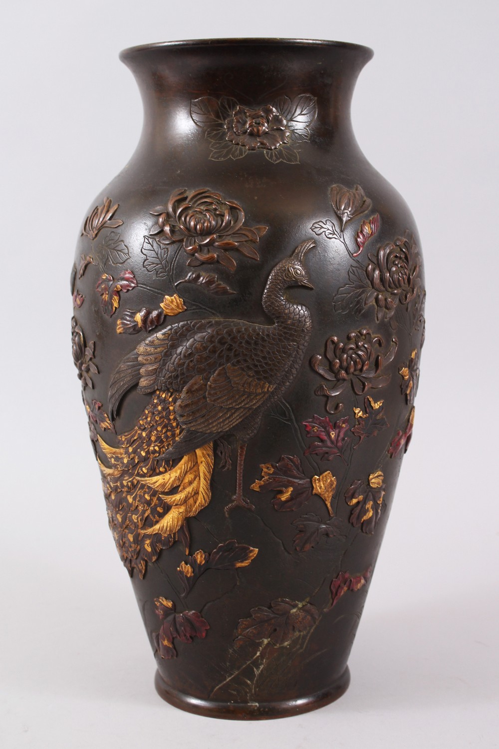 A GOOD JAPANESE MEIJI PERIOD BRONZE & MIXED METAL ONLAID VASE, depicting scenes of a peacock stood