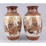 A GOOD PAIR OF JAPANESE MEIJI PERIOD SATSUMA PORCELAIN VASES, finely painted with scenes of immortal