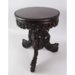 A GOOD 19TH CENTURY CHINESE CARVED HARDWOOD MUSIC STOOL, with prunus style carved frieze, legs