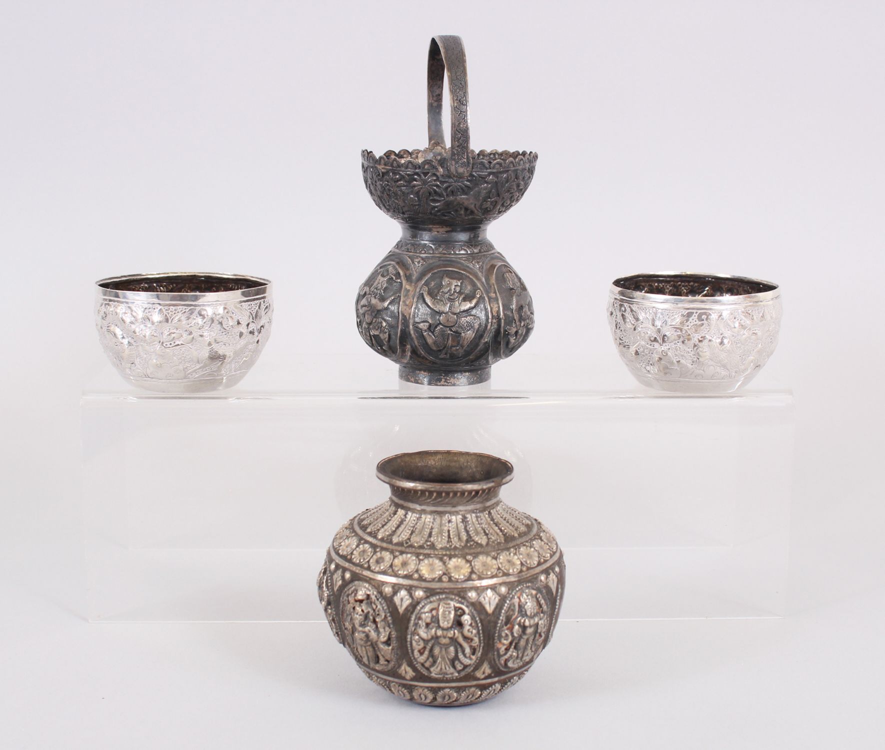 FOUR SMALL PIECES OF INDIAN AND OTHER SILVER including a pair of circular bowls.