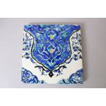 A 19TH CENTURY TURKISH POTTERY TILE, 20cm square.