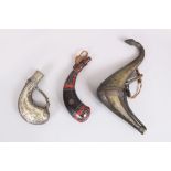 A COLLECTION OF THREE SMALL ISLAMIC POWDER HORNS, 17cm x 10cm long.