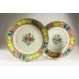 A PAIR OF 19TH CENTURY CHINESE CANTON DISHES / PLATES, decorated with floral pattern, 32.5cm