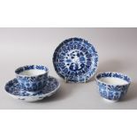 A GOOD PAIR OF CHINESE KANGXI BLUE & WHITE PORCELAIN TEA CUPS AND SAUCERS, the scalloped rim saucers