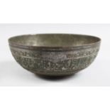 A PERSIAN ISLAMIC SILVER CIRCULAR HAND CHASED COPPER BOWL, signed and dated 1851, 20cm diameter.